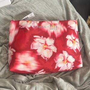 Clinique Red Floral Cosmetic Bag and lotions